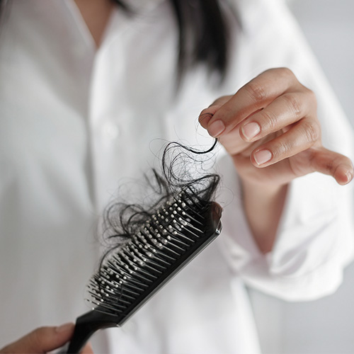 Weak hair roots due to pulling or tying hair too tightly.