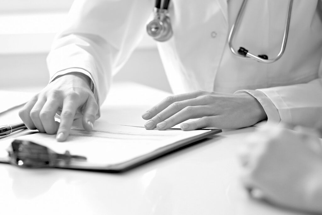 Dermatologist managing membership records