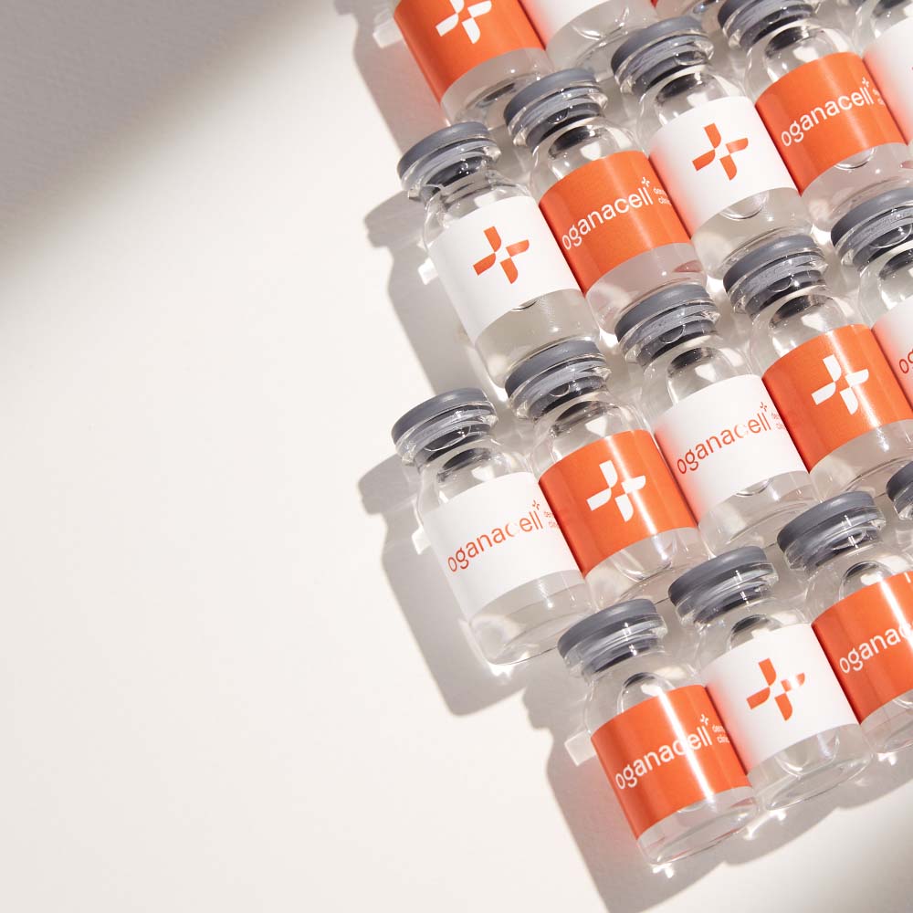 Rows of skincare serum vials for dermatological treatments.