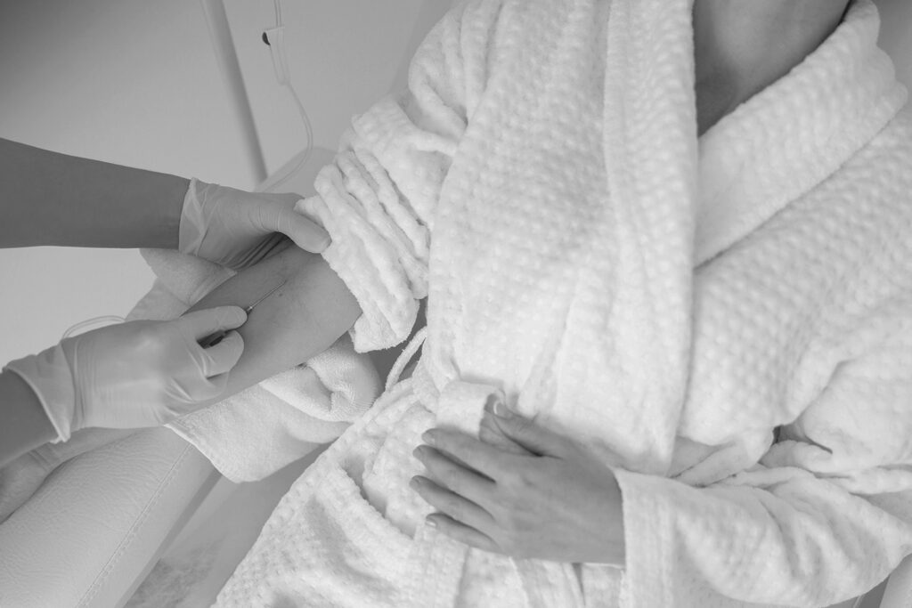 Board-certified dermatologist at Oganacell providing fluid injection therapy for high patient satisfaction