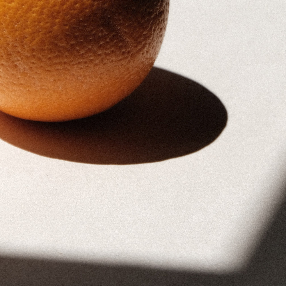 Orange representing skin pore treatment at dermatology clinic - achieving smooth, pore-free skin